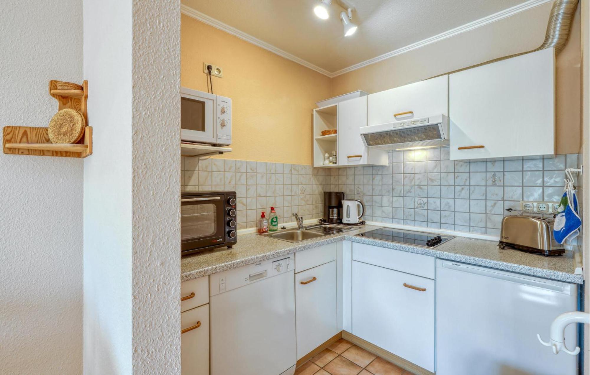 Nice Home In Toenning With Kitchen Buitenkant foto